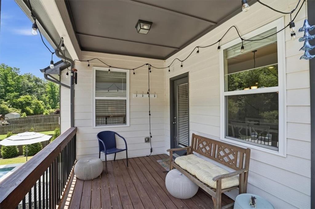 6265 Privet Way Cumming, GA 30028 - Photo 14 of 47 a view of a balcony with furniture