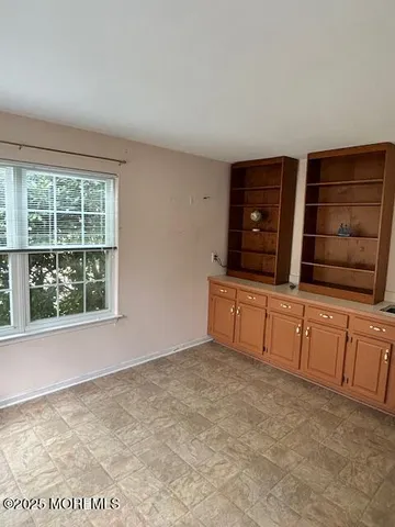 front view of a house with a street