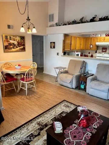 a living room with furniture and a table