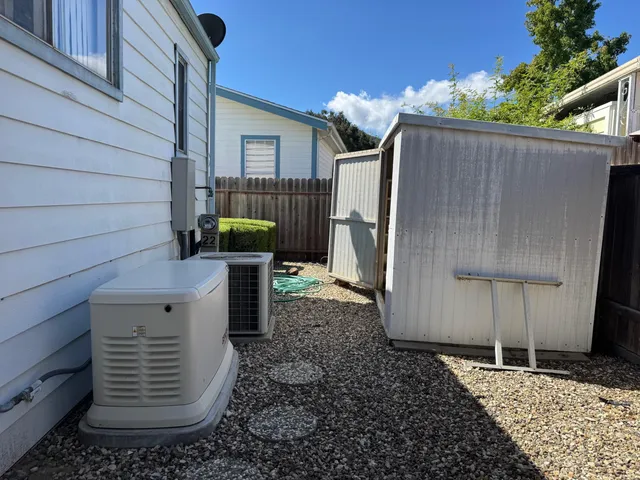 a view of a back yard of the house
