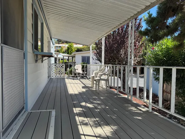 a view of balcony with chairs