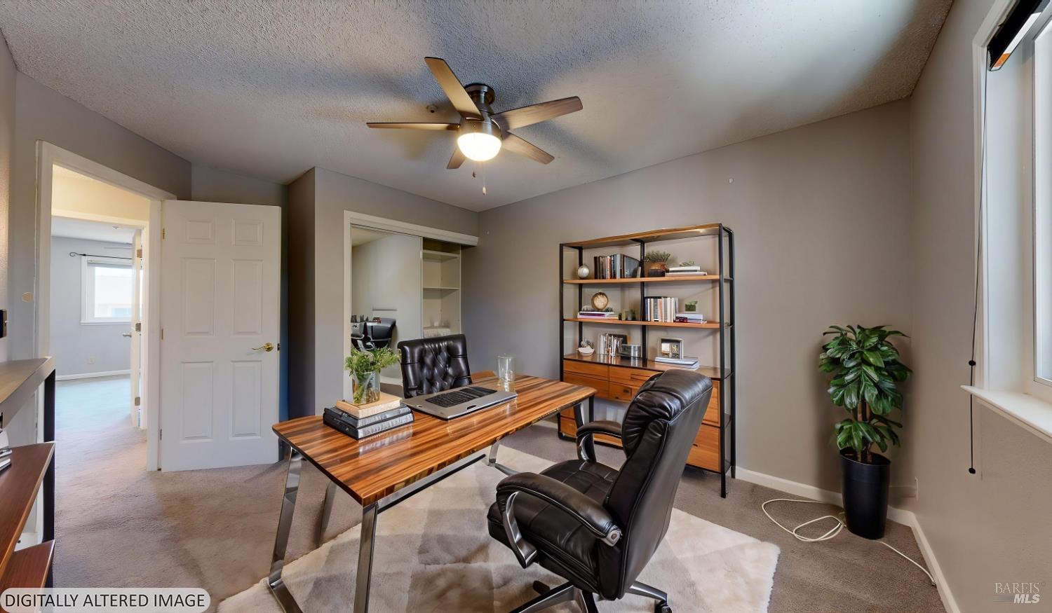 4571 Harbor Lane Rohnert Park, CA 94928 - Photo 52 of 79 a living room with furniture a potted plant and a window