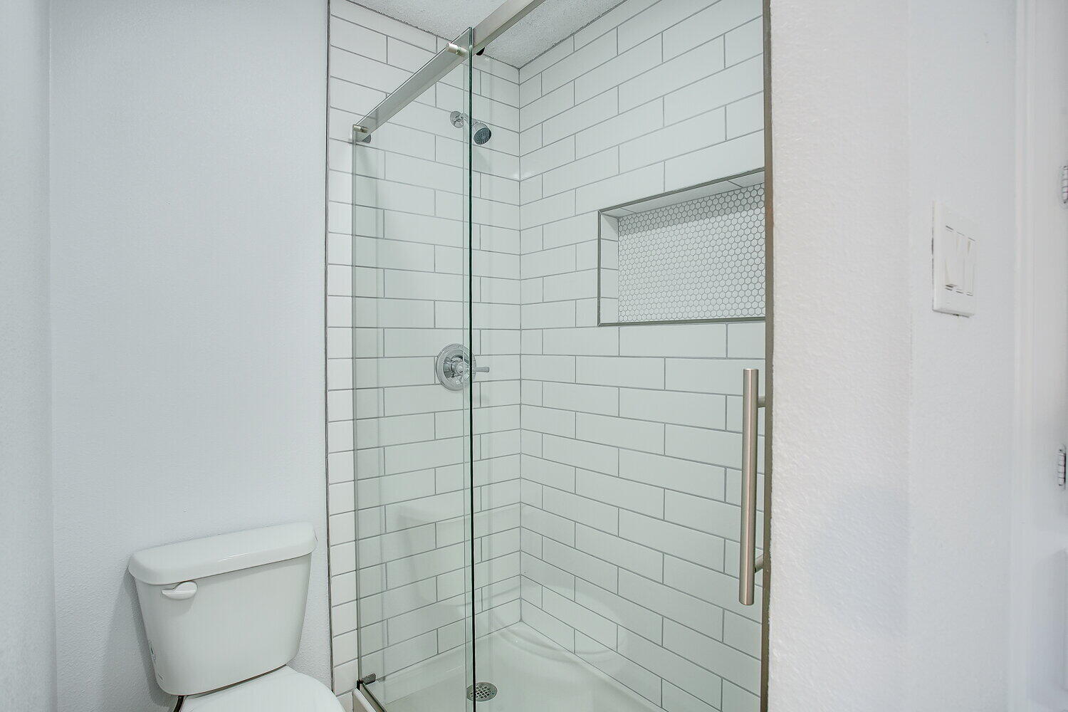 4804 76th Street, Unit A Lubbock, TX 79424 - Photo 23 of 31 a bathroom with a shower