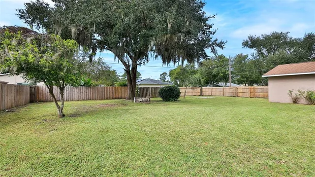 a house view with a garden space
