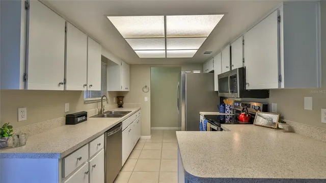 a view of a kitchen and living room