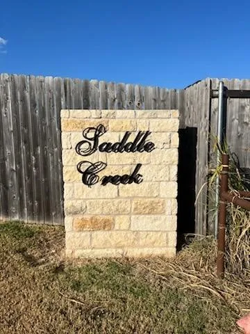 a view of a wooden fence