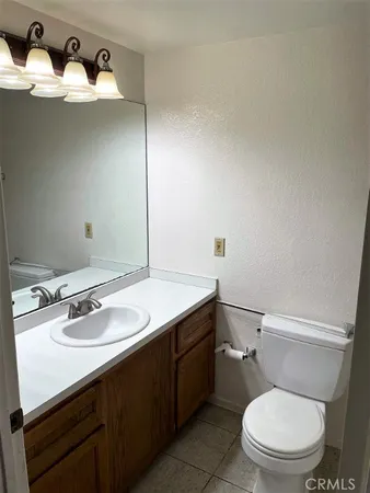 a view of a balcony with wooden floor