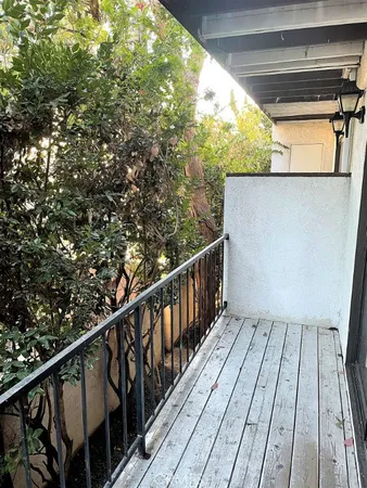 a front view of a house with parking space