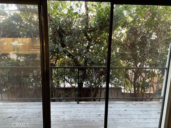 a view of a street from a balcony