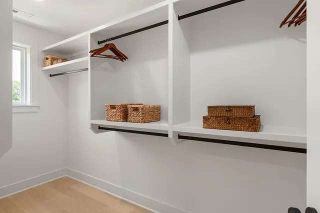 a view of room with racks on the wall