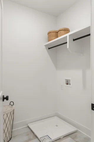 a dining room with a table and chairs