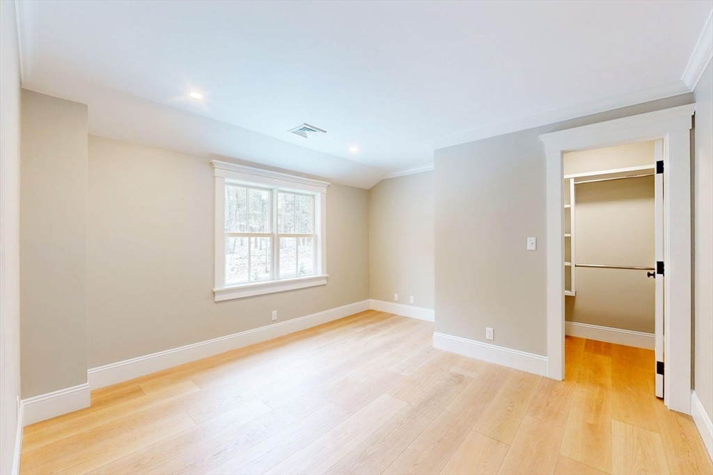 298 Summer Street Westwood, MA 02090 - Photo 15 of 24 a view of an empty room with a window