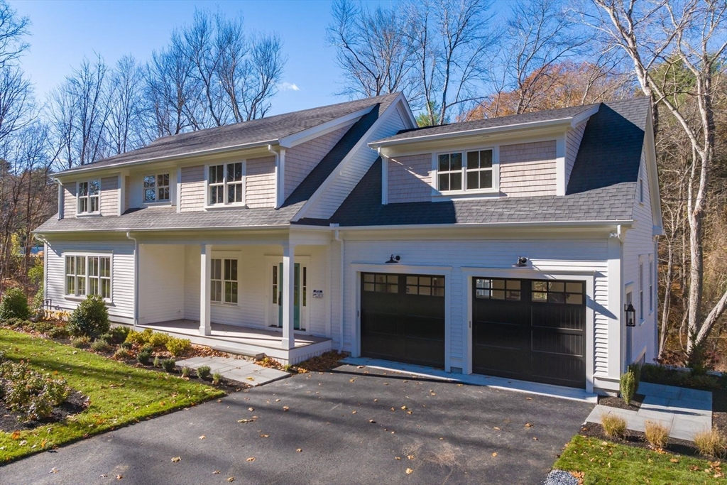 298 Summer Street Westwood, MA 02090 - Photo 3 of 24 a front view of a house with yard