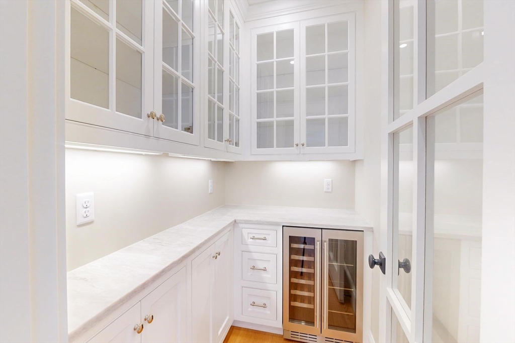 298 Summer Street Westwood, MA 02090 - Photo 6 of 24 a view of an entryway with wooden floor