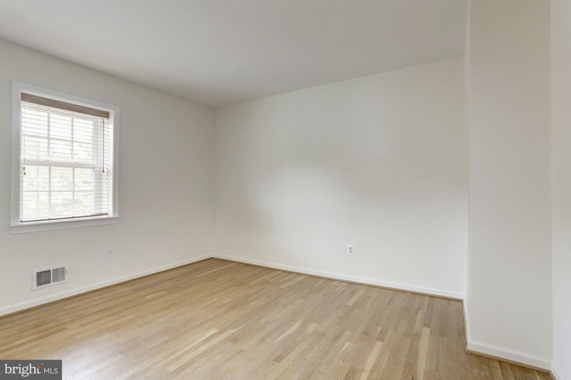 10239 Gainsborough Road Potomac, MD 20854 - Photo 17 of 21 an empty room with a window