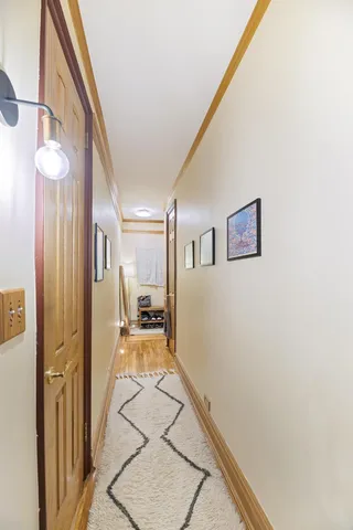 a view of living room with furniture and book shelf