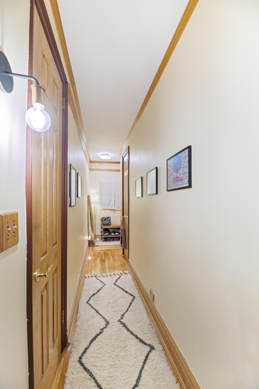 170 East 94th Street, Unit 5E Manhattan, NY 10128 - Photo 5 of 8 a view of a hallway with a livingroom and having dining room