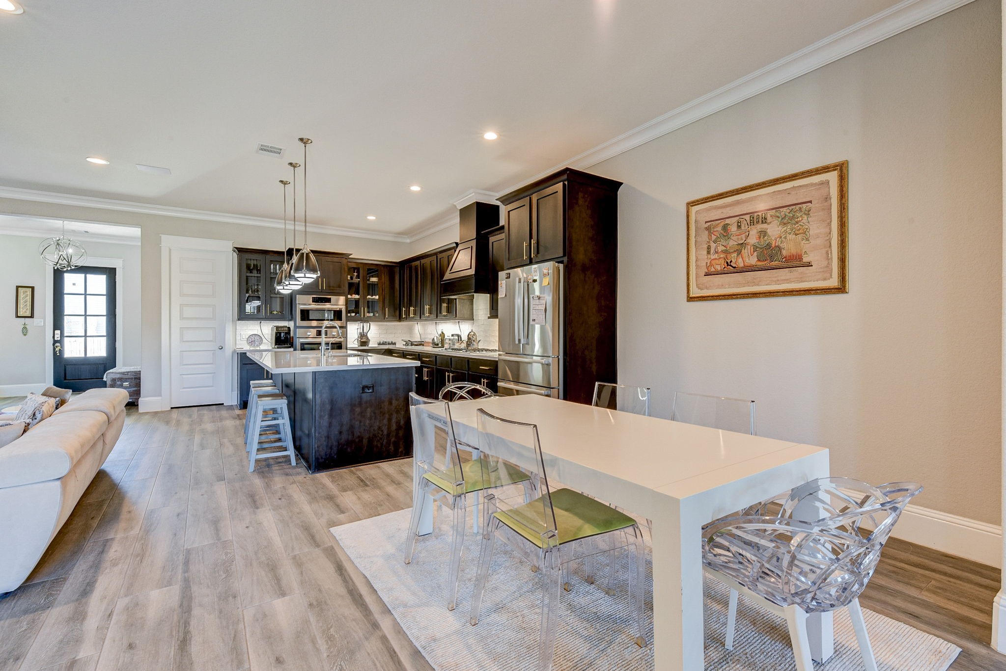 2339 Pale Star Drive Conroe, TX 77384 - Photo 20 of 43 a large kitchen with a table and chairs