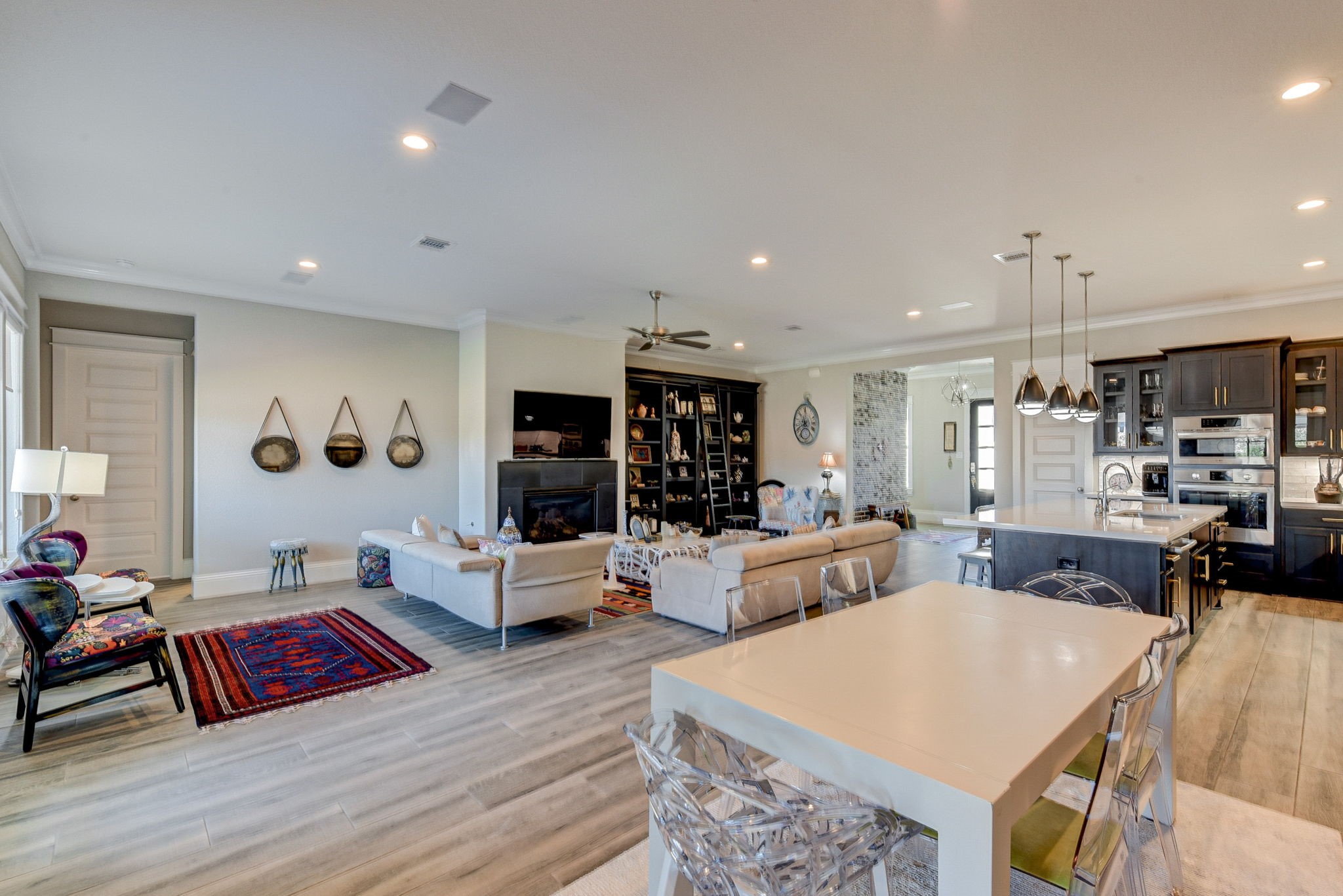 2339 Pale Star Drive Conroe, TX 77384 - Photo 21 of 43 a living room with furniture and wooden floor