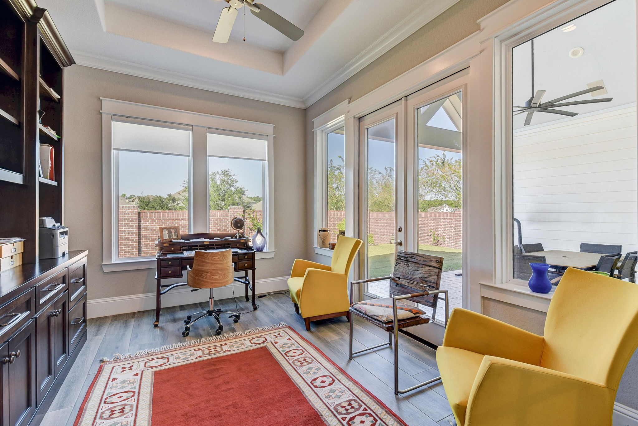 2339 Pale Star Drive Conroe, TX 77384 - Photo 23 of 43 a living room with furniture and a floor to ceiling window