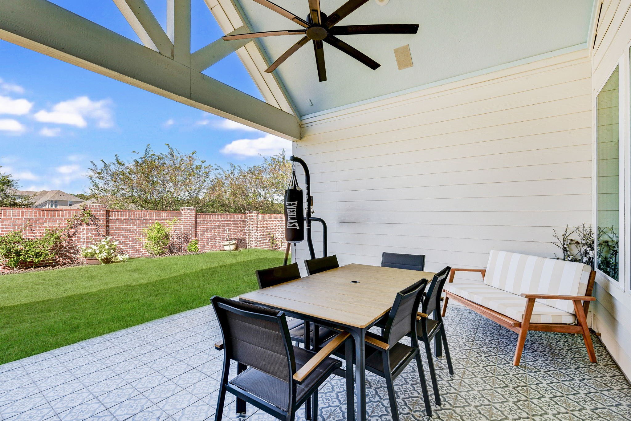 2339 Pale Star Drive Conroe, TX 77384 - Photo 38 of 43 a view of a patio with a table and chairs