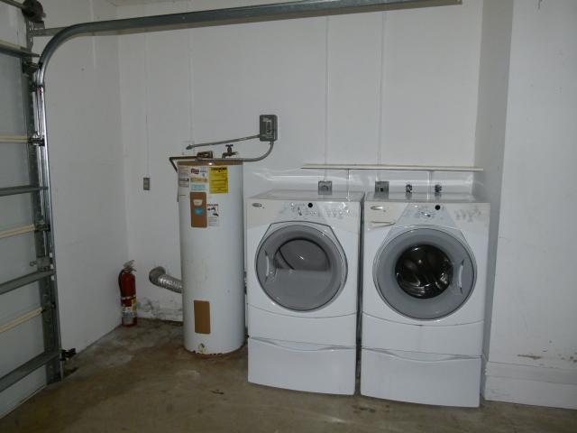 21554 Coronado Avenue Boca Raton, FL 33433 - Photo 3 of 7 a utility room with dryer and washer