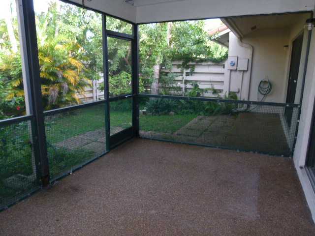 21554 Coronado Avenue Boca Raton, FL 33433 - Photo 7 of 7 a view of a porch with a yard