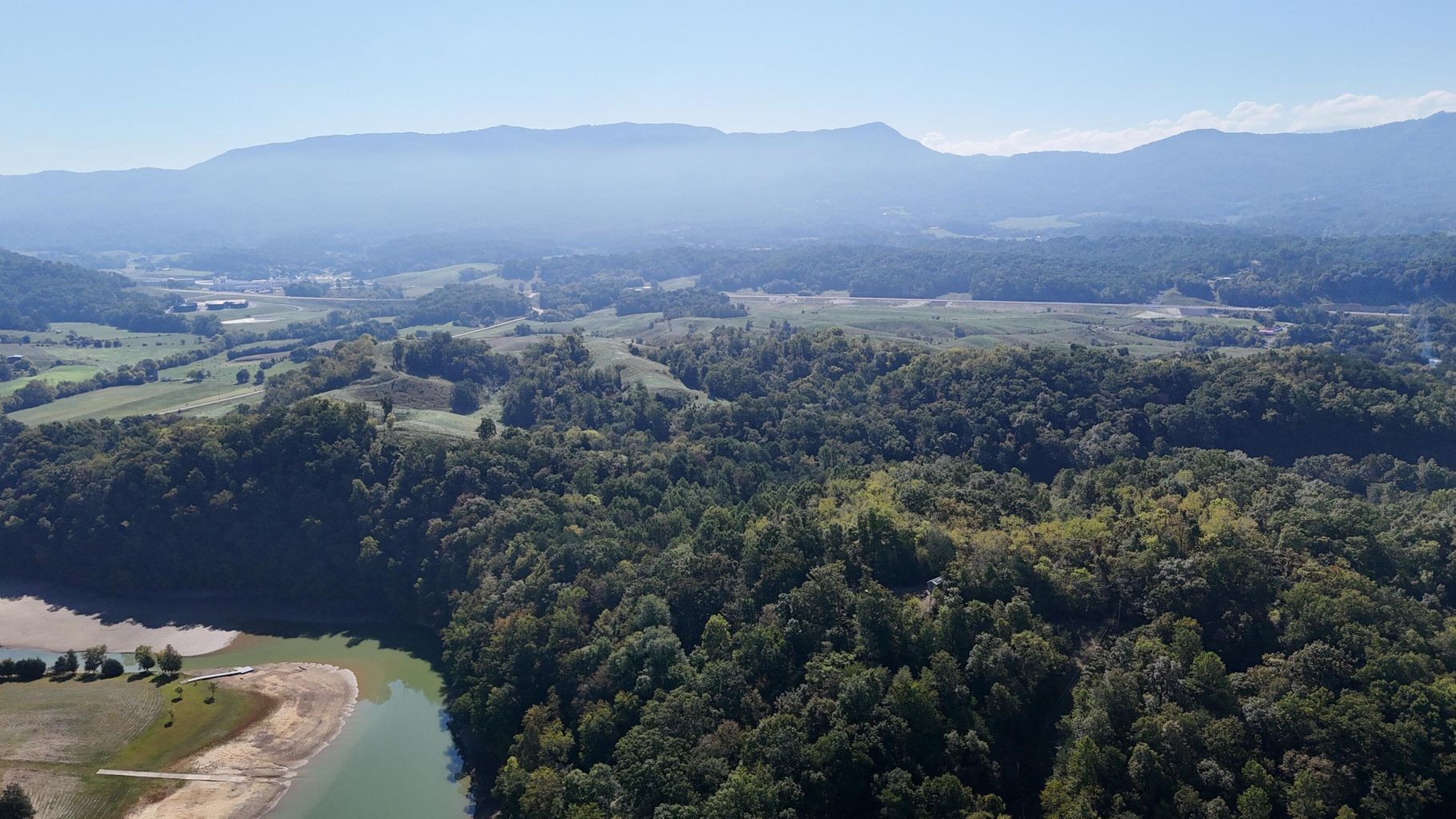23 Caywood Road Dandridge, TN 37725 - Photo 14 of 18 a view of a house with a mountain in the background