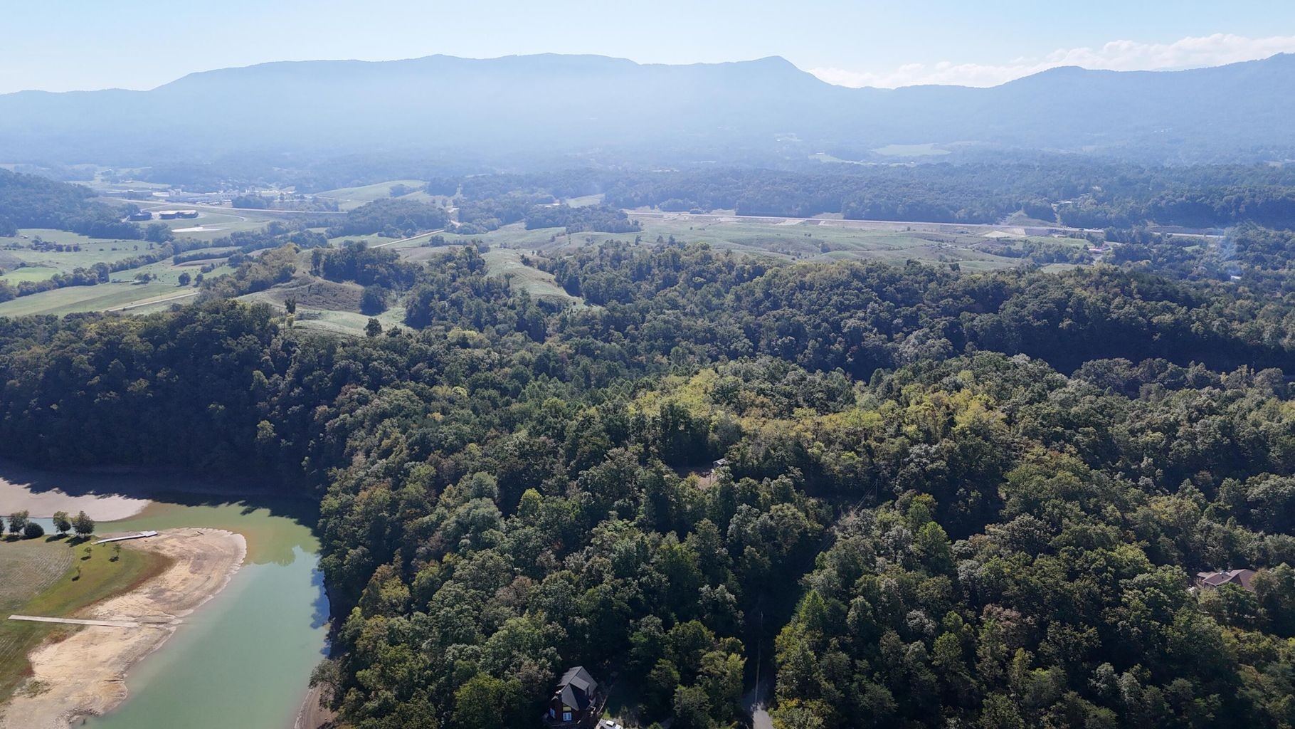23 Caywood Road Dandridge, TN 37725 - Photo 15 of 18 an aerial view of house with yard and mountain view in back