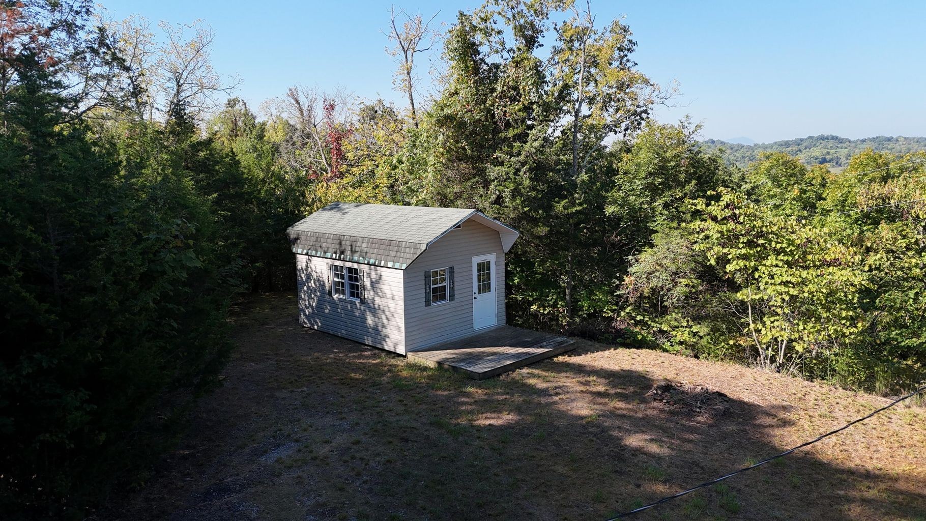23 Caywood Road Dandridge, TN 37725 - Photo 6 of 18 a view of a house with a yard