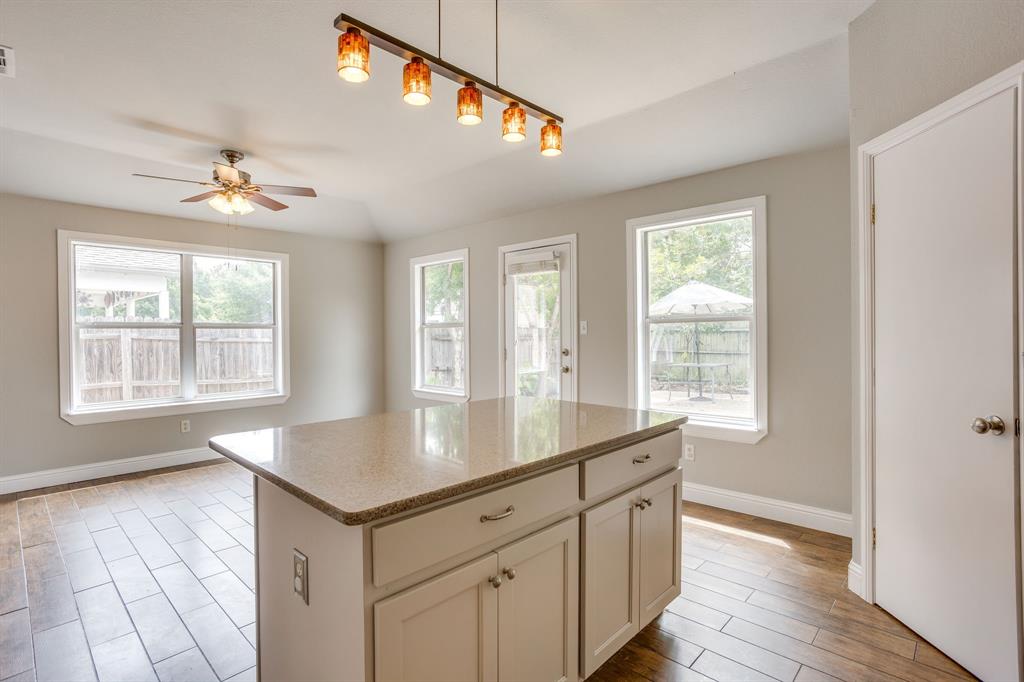9825 Stoney Bridge Road Fort Worth, TX 76108 - Photo 12 of 40 Island overlooking dining area