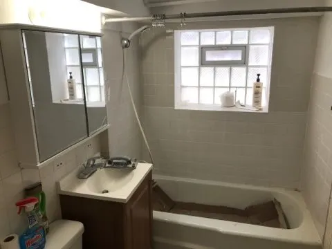 a bathroom with a sink and a bathtub