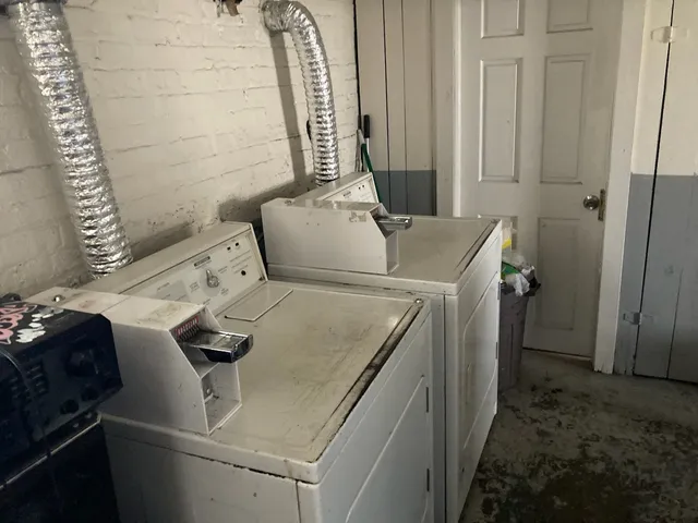 a close view of light fixtures and racks on the wall