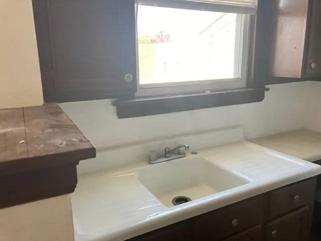 a bathroom with a sink and a bathtub