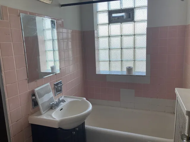 a bathroom with a sink and a bathtub