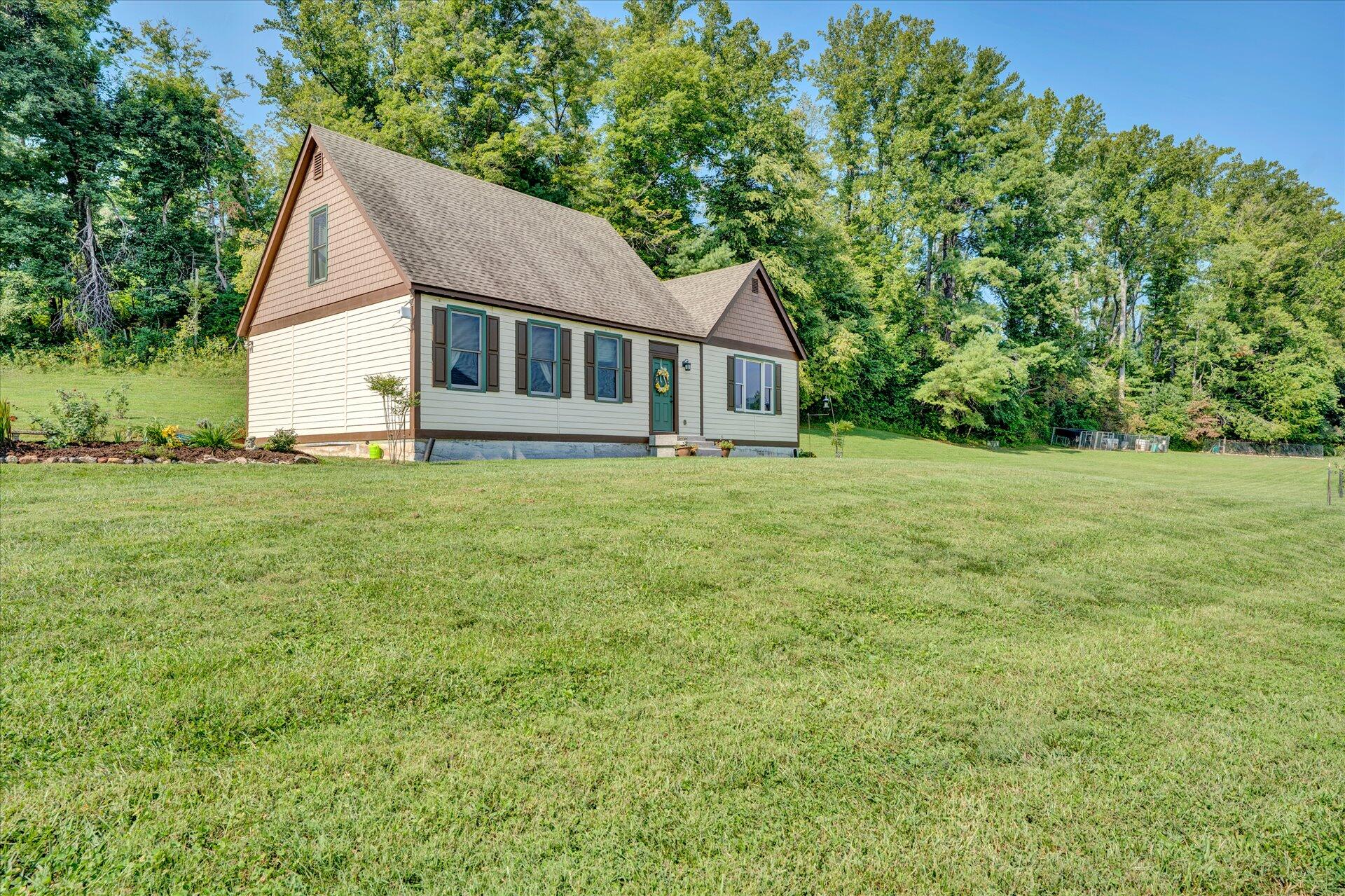 2235 Dillons Mill Road Callaway, VA 24067 - Photo 40 of 40 a view of a house with a yard