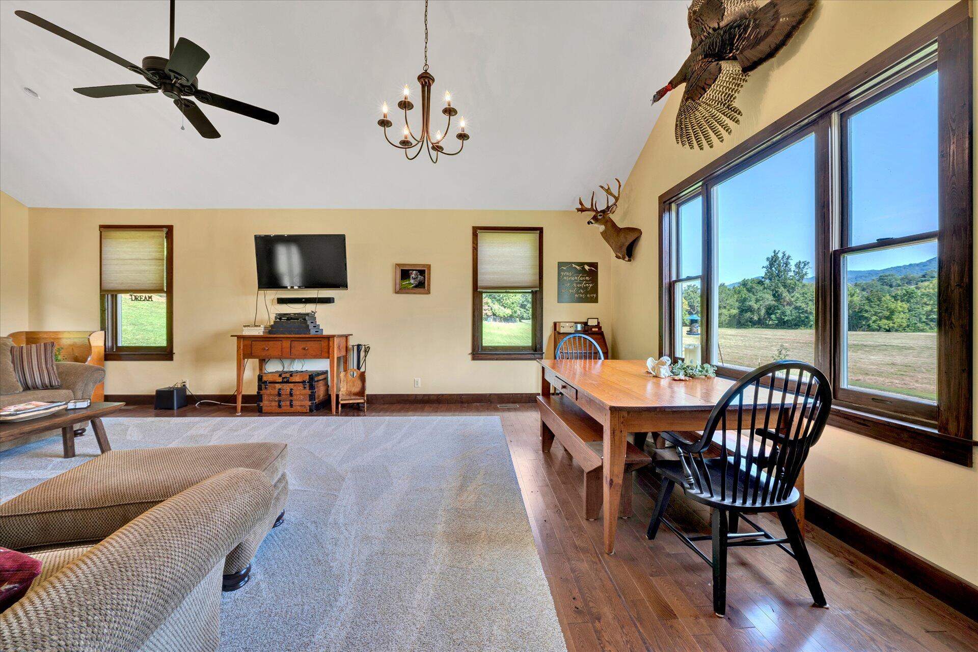 2235 Dillons Mill Road Callaway, VA 24067 - Photo 9 of 40 a view of a livingroom with furniture window and wooden floor