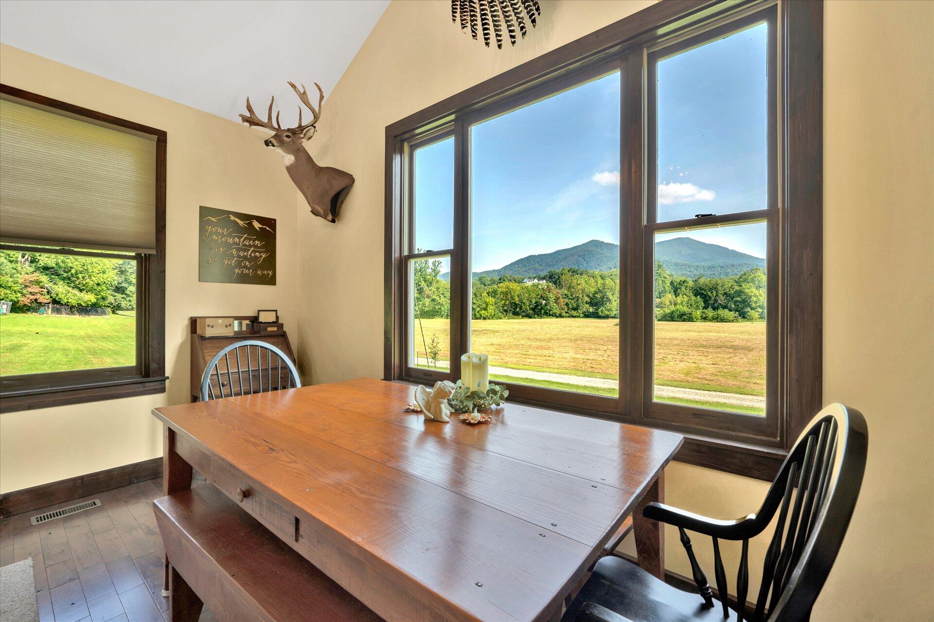 2235 Dillons Mill Road Callaway, VA 24067 - Photo 10 of 40 a view of a dining room with furniture window and wooden floor