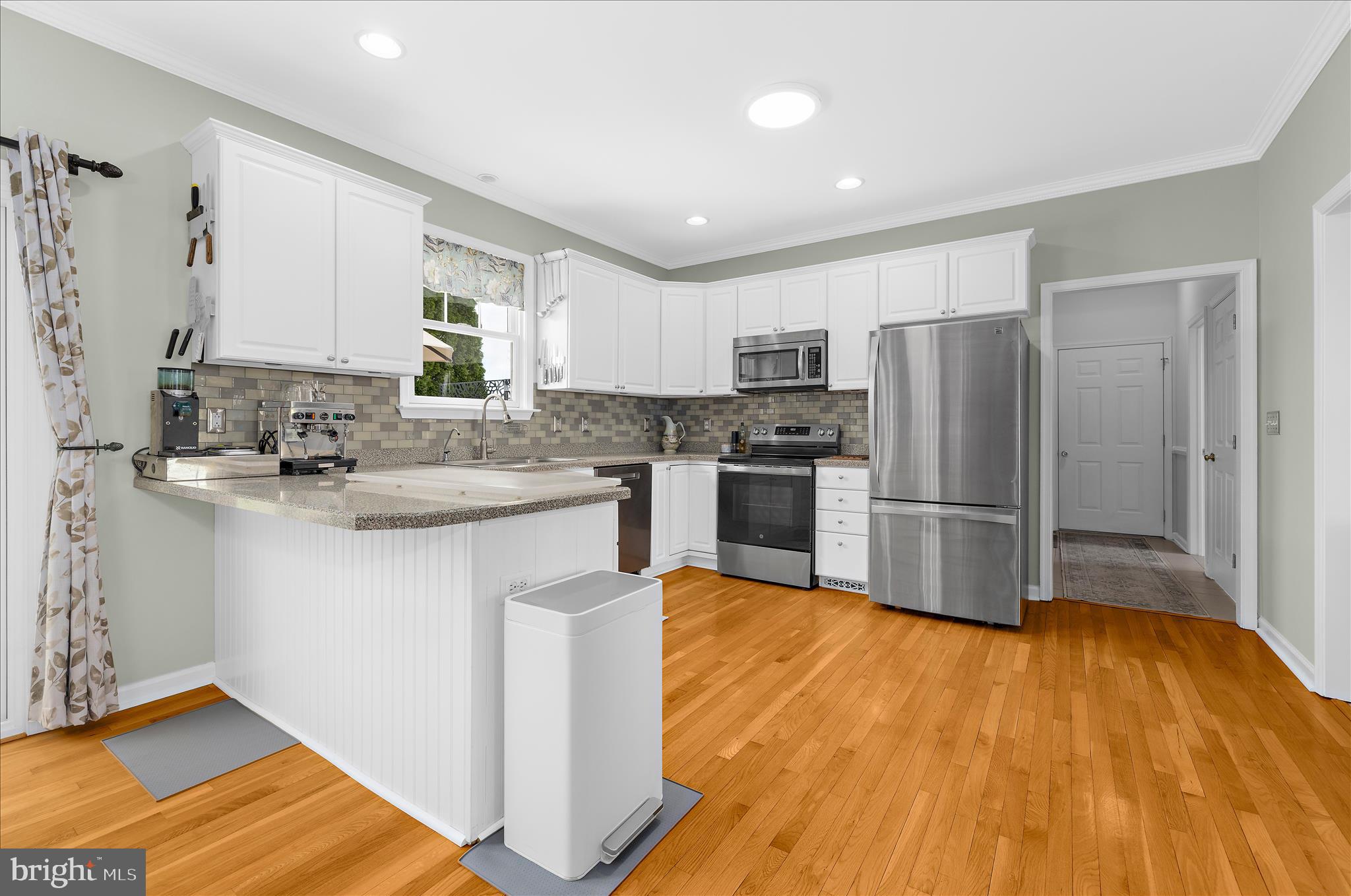 988 White Marsh Road Centreville, MD 21617 - Photo 14 of 96 a kitchen with stainless steel appliances granite countertop a refrigerator sink and stove