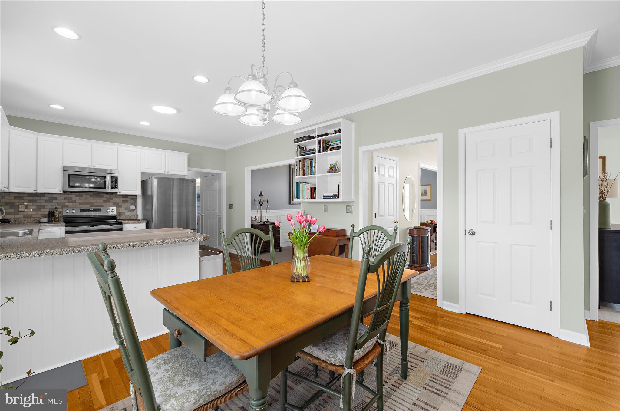 988 White Marsh Road Centreville, MD 21617 - Photo 19 of 96 a view of a dining room with furniture and wooden floor