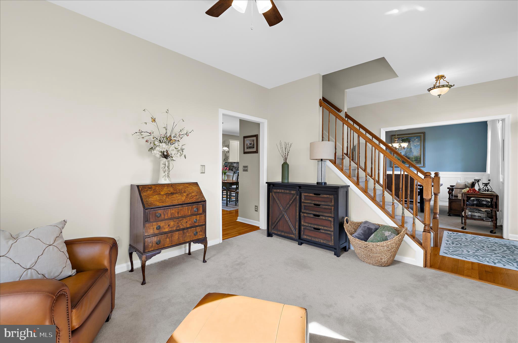 988 White Marsh Road Centreville, MD 21617 - Photo 26 of 96 a room with stairs and a chandelier fan