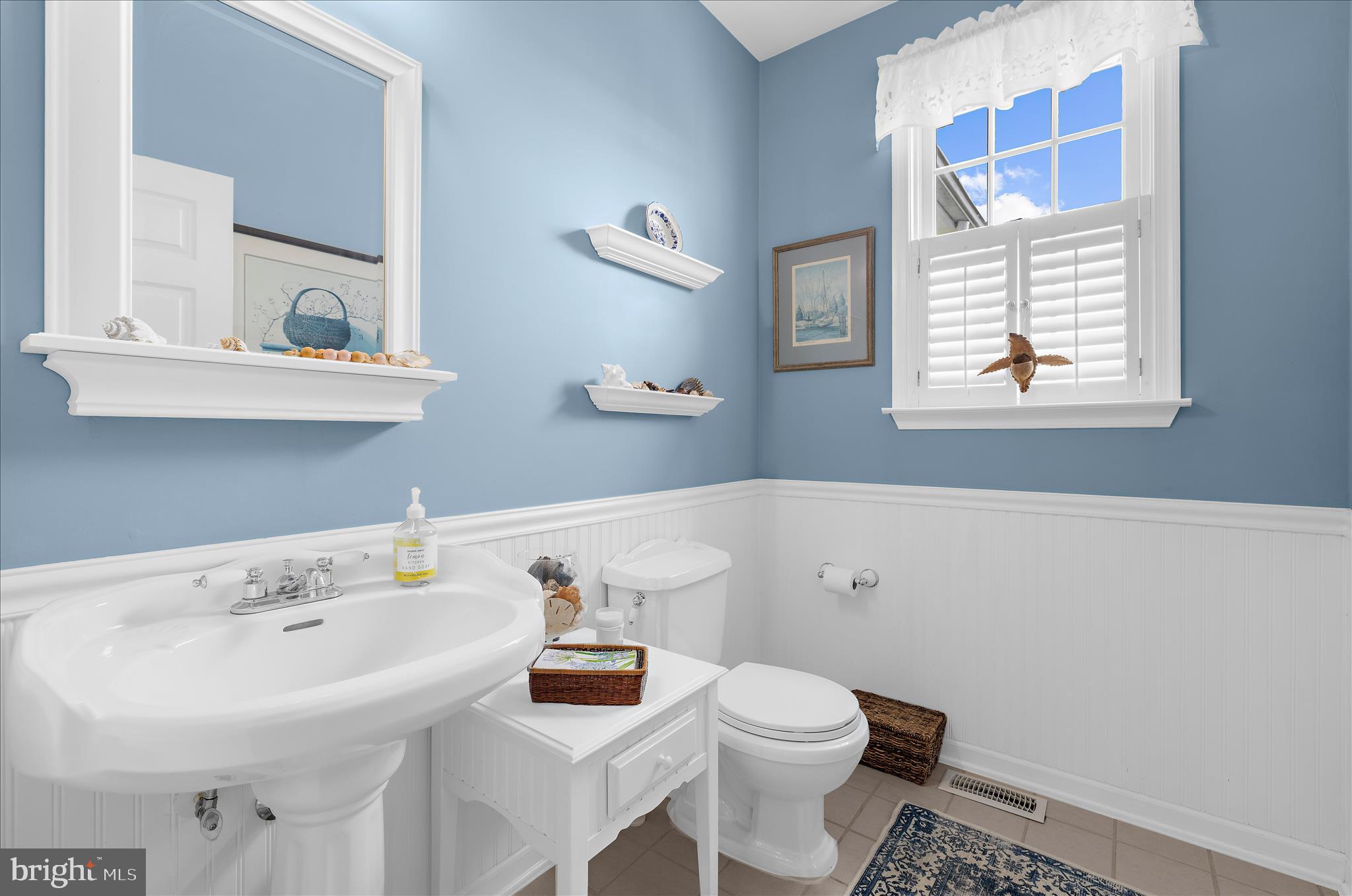 988 White Marsh Road Centreville, MD 21617 - Photo 33 of 96 a bathroom with a sink and a toilet