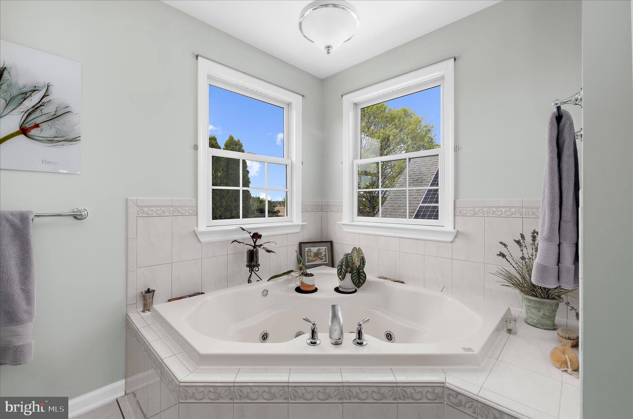 988 White Marsh Road Centreville, MD 21617 - Photo 39 of 96 a white bath tub sitting in a bathroom next to a window