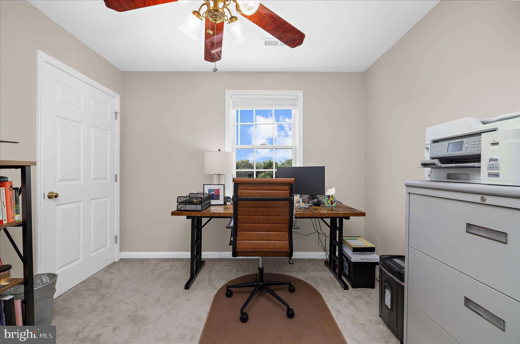 988 White Marsh Road Centreville, MD 21617 - Photo 49 of 96 a view of a workspace with furniture and a window
