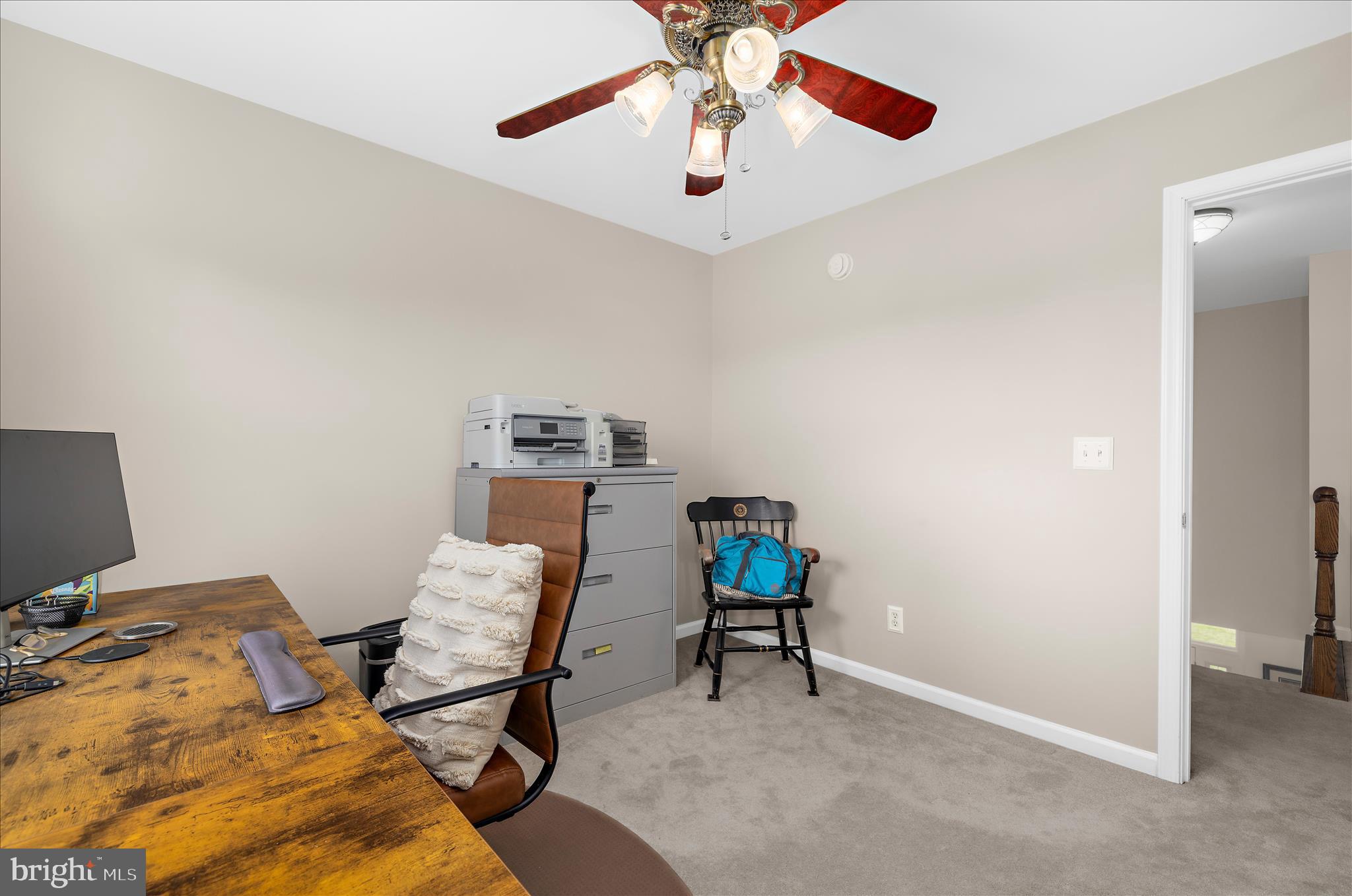 988 White Marsh Road Centreville, MD 21617 - Photo 50 of 96 a workspace with furniture and wooden floor