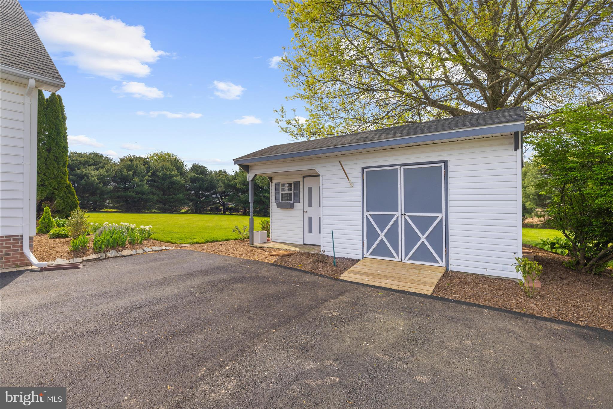 988 White Marsh Road Centreville, MD 21617 - Photo 62 of 96 a view of a house with backyard and a patio