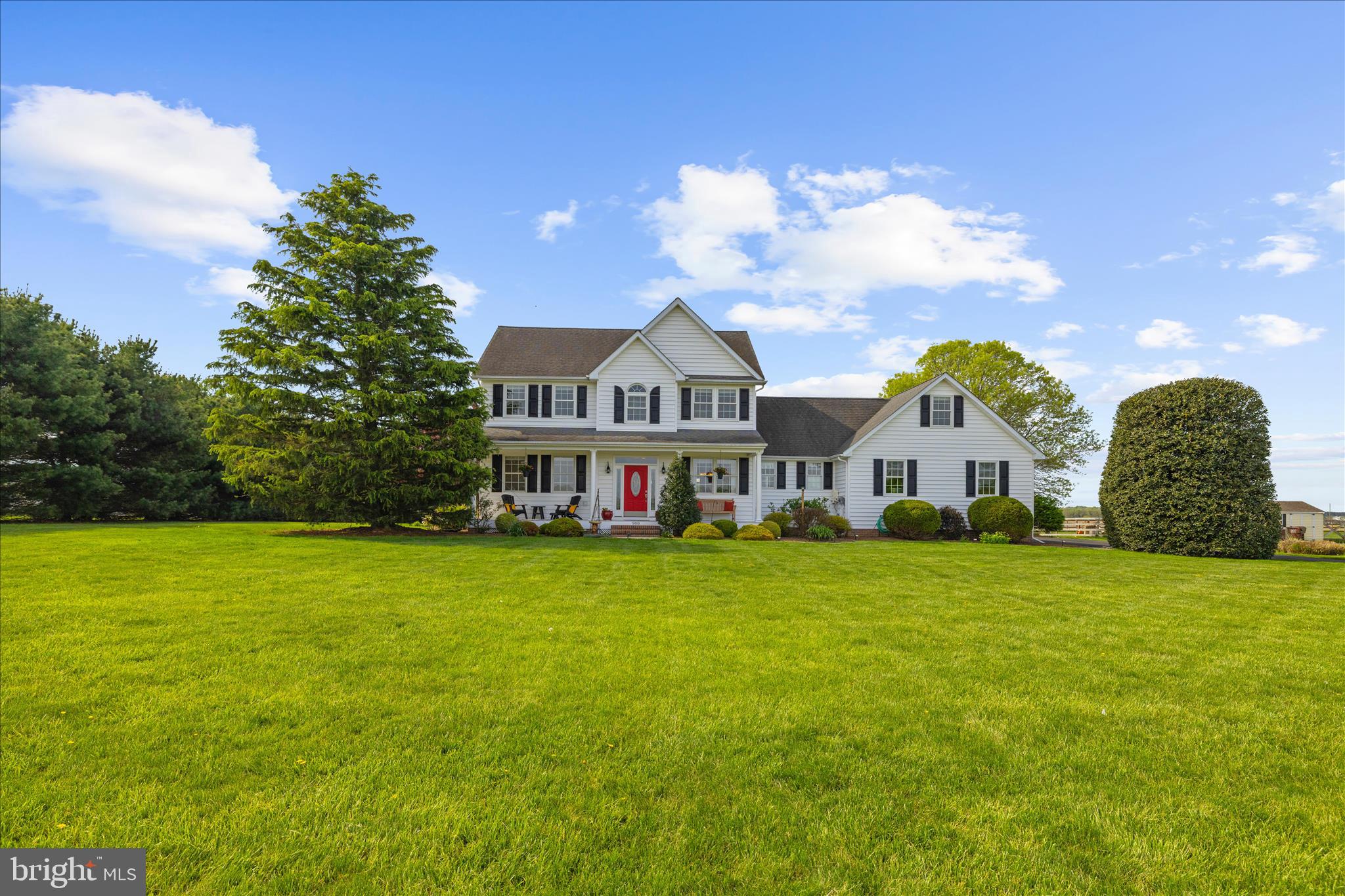 988 White Marsh Road Centreville, MD 21617 - Photo 67 of 96 a view of a big house with a big yard and large trees