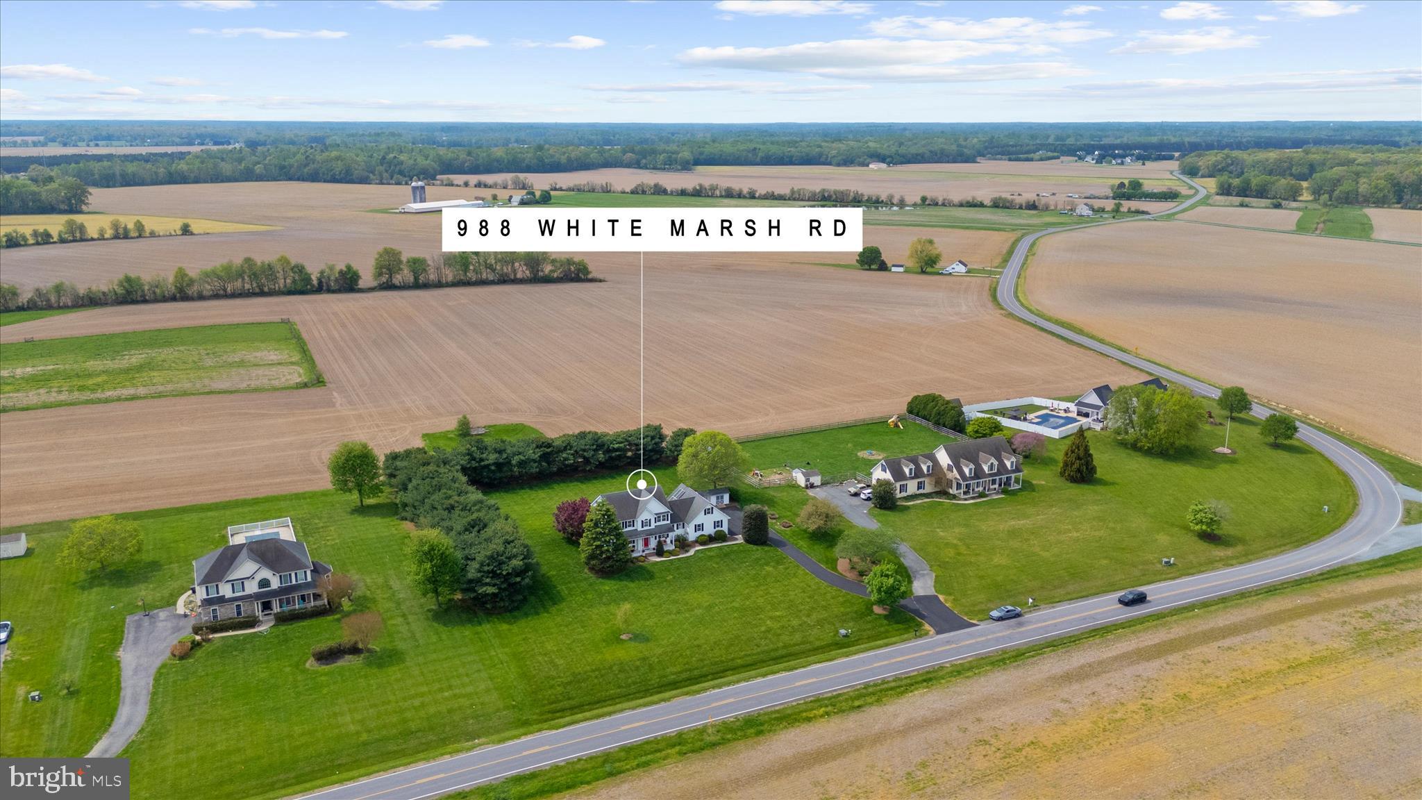 988 White Marsh Road Centreville, MD 21617 - Photo 78 of 96 a view of a swimming pool with an outdoor seating
