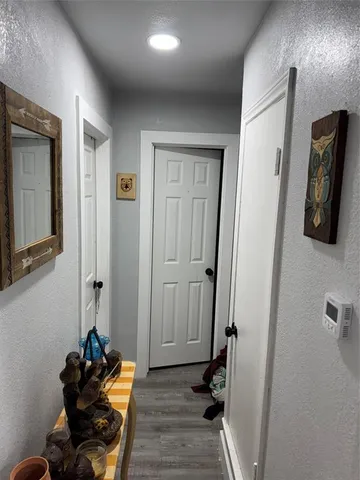 a view of a hallway with workspace