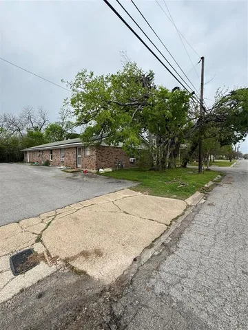 a view of a street with cars